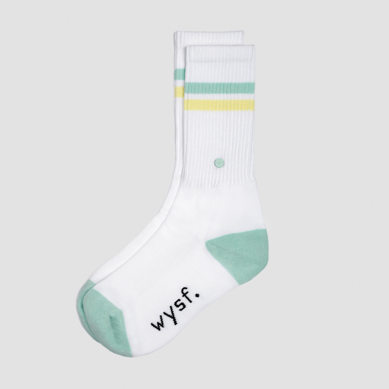 nachhaltige sportsocken damen, nachhaltige sportsocken herren von what you stand for. tennissocke, farbe weiß, mintgrün, pastellgelb. fair hergestellt in portugal. wysf. mode, mit der du zeigst, wer du bist.