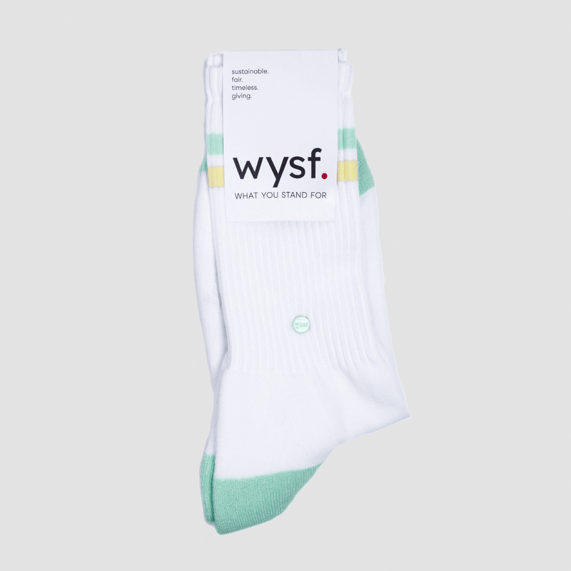 nachhaltige sportsocken damen, nachhaltige sportsocken herren von what you stand for. tennissocke, farbe weiß, mintgrün, pastellgelb. fair hergestellt in portugal. wysf. mode, mit der du zeigst, wer du bist.